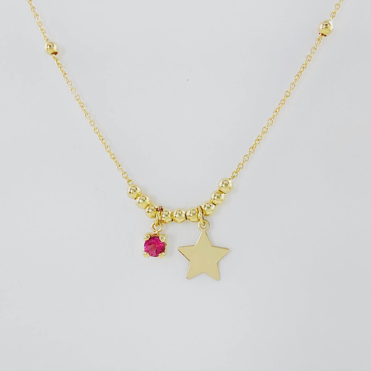 COLLAR BOLAS Y TOPACIO ROSA CON ESTRELLA