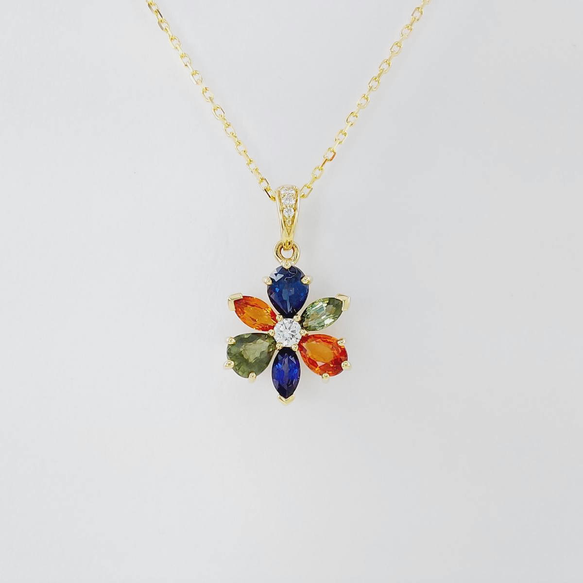 COLGANTE ZAFIROS DE COLORES 0,96 CT Y BRILLANTES 0,04 CT